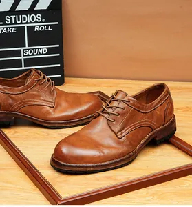 Detailed view of vintage washed horsehide leather Derby shoes with Goodyear welted sole.