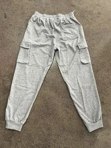 Detailed back view of grey heavy loose high street casual cargo sweatpants with pockets