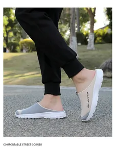 Detailed view of breathable mesh slip-on mules for men and women on a path.