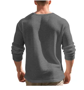 Detailed back view of a grey waffle knit long-sleeved T-shirt for men