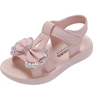Sandalias de princesa rosas para niña con lazo de diamantes y suela blanda para la playa.