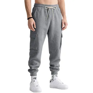 Detailed view of grey heavyweight American cargo joggers with drawstring and pockets