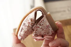 Detail showing the highly flexible soft sole on pink rhinestone girls princess sandals