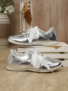 Silver metallic German army trainer sneakers with white ribbon laces for women