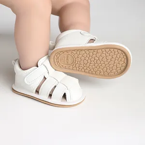 White breathable infant sandals with soft non-slip sole and hook-and-loop closure
