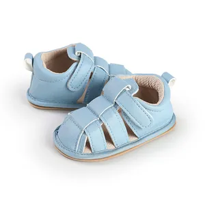 Close-up view of light blue baby soft sole breathable sandals with velcro straps