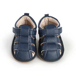 Professional top-down view of navy blue breathable leather baby sandals for toddlers