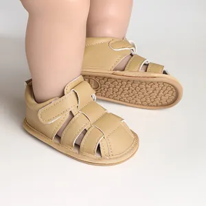 Close-up detail of beige baby sandals featuring breathable cutouts and a soft non-slip sole.