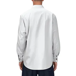 Detailed back view of a men's solid color long-sleeve casual shirt with a classic stand collar