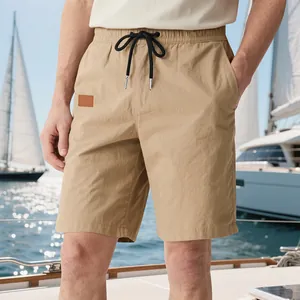 Short beige pour homme avec cordon de serrage en tissu sergé respirant pour l'été