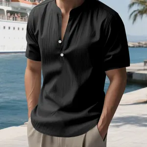 Close-up of black men's casual linen shirt with stand collar and textured fabric