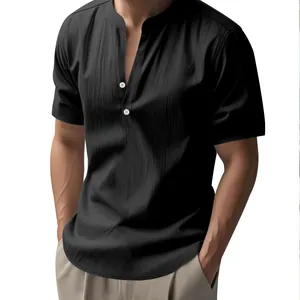 Detail view of a men's black short-sleeved linen shirt with stand collar and buttons