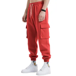 Detailed view of men's red heavy weight cargo sweatpants with high street style