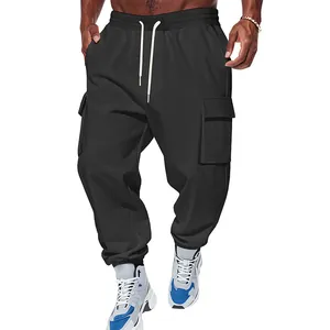 Detailed view of black men's cargo joggers with multiple pockets and elastic cuffs.
