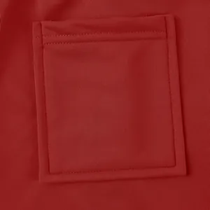 Close-up of heavy-weight red cargo pocket stitching on men's casual pants