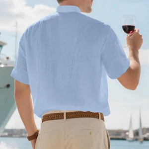 Back view of a breathable light blue linen shirt for men in a summer yacht setting