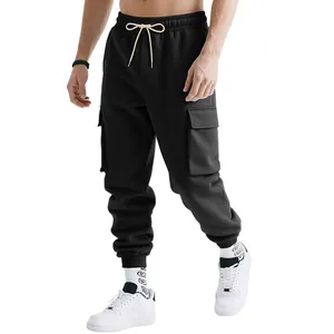 Detailed view of mens black heavyweight cargo joggers with multi-pockets and drawstring waist