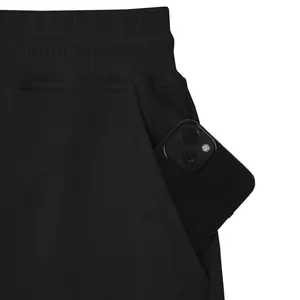 Detail view of deep side pocket on black heavy weight cotton cargo pants