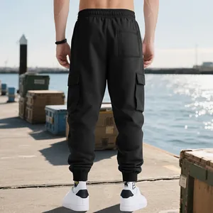 Detailed back view of mens black heavyweight cargo joggers with a loose high street fit
