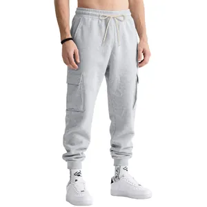 Men's heavy fleece cargo pants in grey featuring elastic cuffs and functional side pockets.