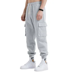 Men's heavy gray cargo joggers with multi-pockets and elastic waist, side view detail.