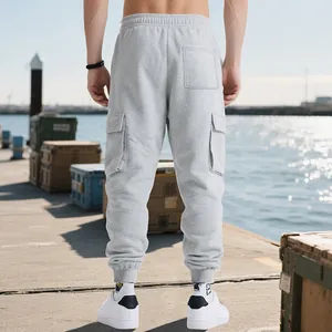 Rear view detail of men's grey heavy weight cargo jogger pants at outdoor port