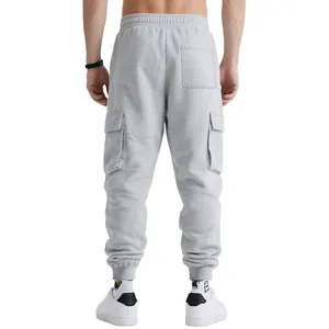 Rear view of men's heavyweight grey cargo sweatpants featuring multi-pockets and cuffed ankles