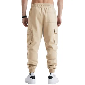 Back view of men's heavy cotton cargo sweatpants in khaki with multi-pocket design