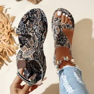 Detailed view of bohemian paisley print flat sandals for women summer 2025