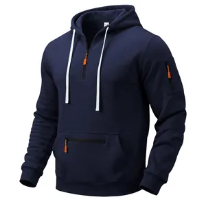 Detailed view of navy blue heavy fleece hoodie with contrasting orange zippers