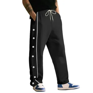 Pantalón de chándal negro pesado con botones de presión laterales y franja blanca