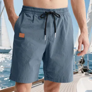 Lightweight blue men's beach shorts with adjustable drawstring and side pockets