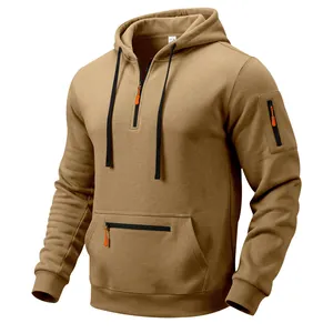 Detailed macro view of khaki men's heavy fleece hoodie featuring orange zipper accents