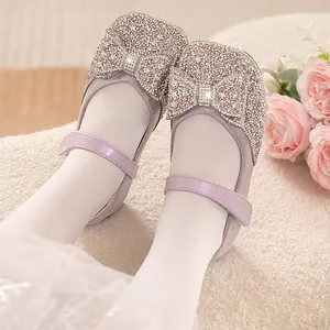 Elegant sparkly rhinestone princess Mary Jane shoes for girls with a decorative bow