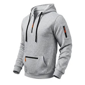 Close-up detail of a gray heavyweight fleece hoodie featuring tactical orange zippers.