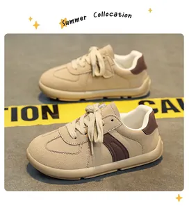 Close-up detail of retro beige German Army style sneakers with stylish brown stripes