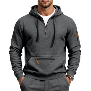 Men's premium grey heavyweight quarter-zip hooded sweatshirt featuring orange zipper details