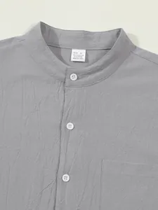 Close-up of gray men's mandarin collar shirt showing fabric texture and size label