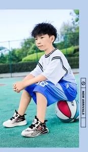 High-quality boys' basketball shoes with rotary buckle and non-slip sole for outdoor sports.
