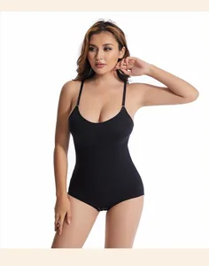 Professional full body view of a black seamless tummy control bodysuit on a female model