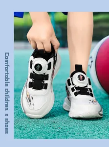 Close-up detail of boys' sports basketball shoes featuring quick rotating buckle system