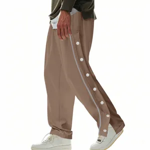 Vista lateral de los pantalones de chándal hip hop para hombre con botones