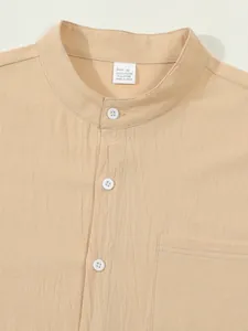 Close-up of a men's stand collar shirt featuring a chest pocket and linen texture