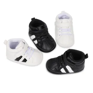 Multiple pairs of black and white high-top infant sports sneakers with soft walking soles