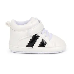 Comfortable white high-top infant sneakers with soft soles and black jagged stripes