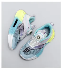 Detailed top view of breathable mesh running shoes with rotary dial lacing system