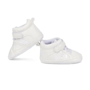 White high-top infant walking shoes with soft soles and velcro straps for baby boys and girls