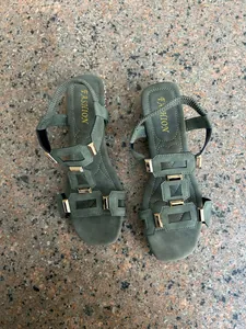 Women's army green flat gladiator sandals with gold buckle details and elastic strap