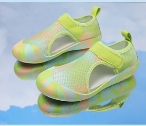 Detailed view of breathable kids' water shoes reflecting a clear blue sky