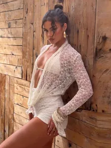 Sexy white lace 3-piece set with hollow long-sleeve cardigan, halter top and slim shorts